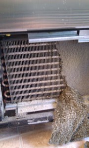 Dirty Condenser Coil On A Commercial Cooler